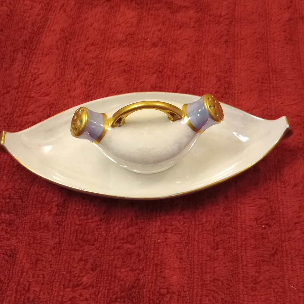 Vintage dual salt and pepper shaker with matching platter